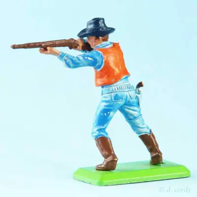 Rückseite einer Britains Cowboy Figur mit Gewehr
