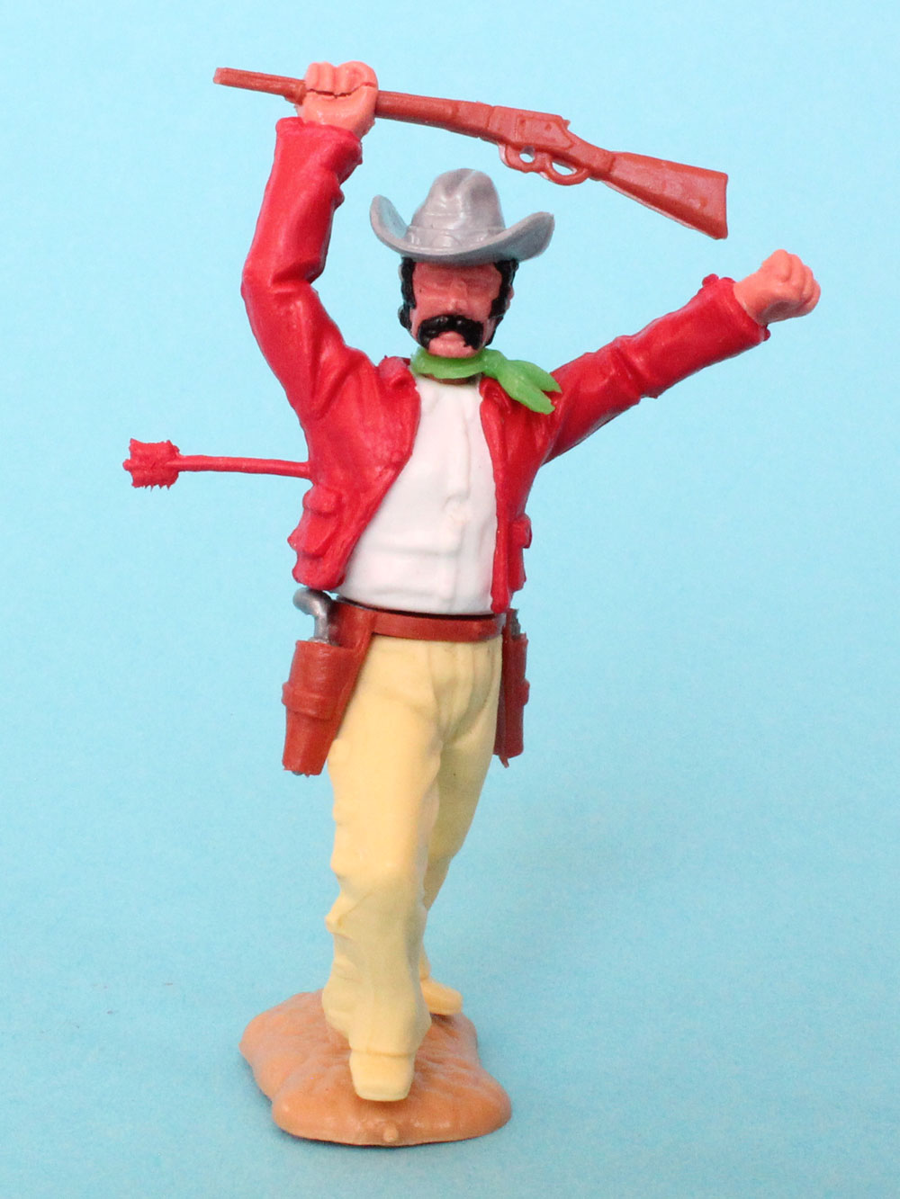 Timpo Toys Cowboy der 3 Generation mit Gewehr und Pfeil im Körper