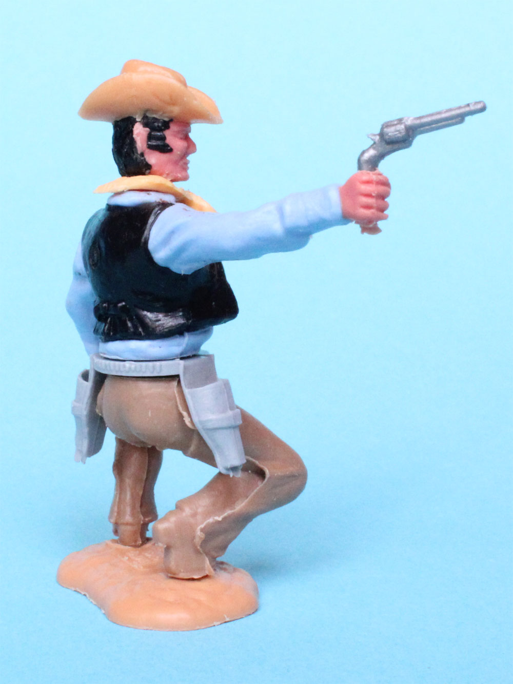 Ein Timpo Cowboy mit Revolver und seltenen Kopf