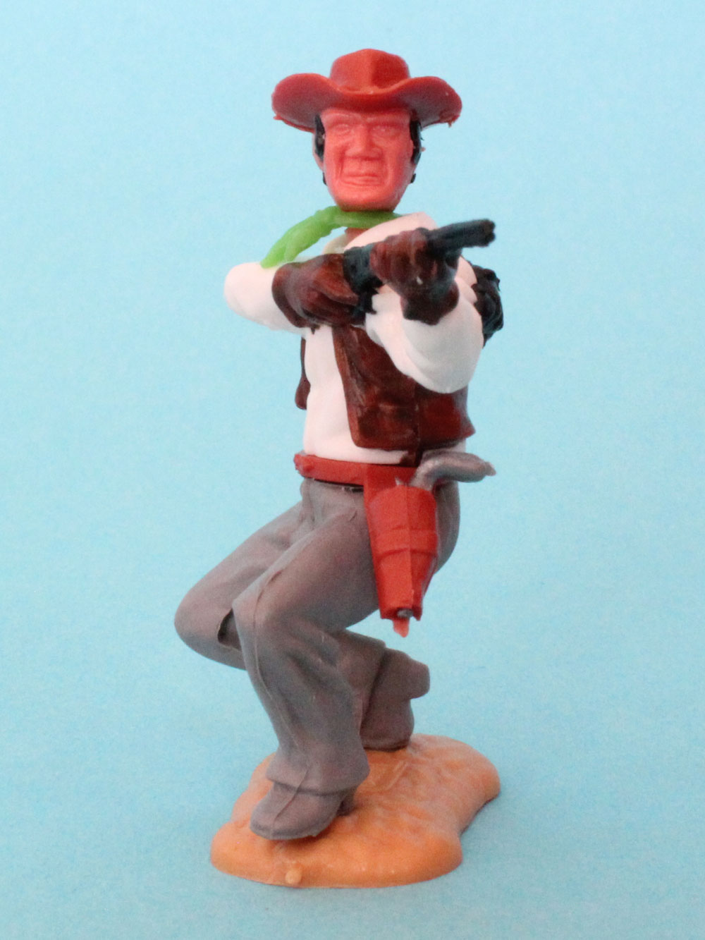 Timpo Toys Cowboy mit Gewehr im Anschlag