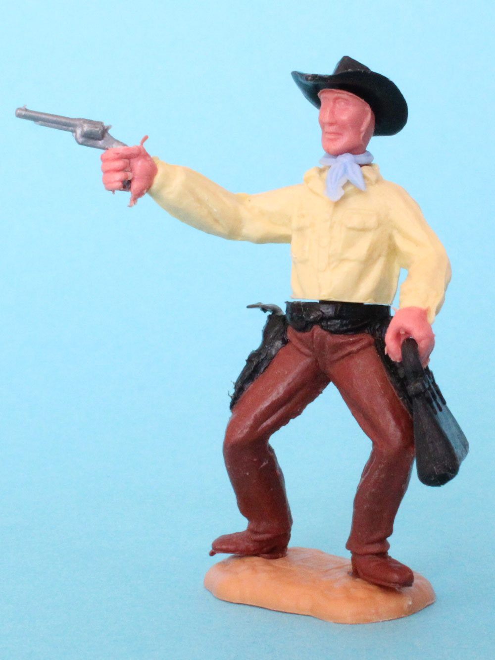 Ein Timpo Cowboy mit Revolver und Tasche